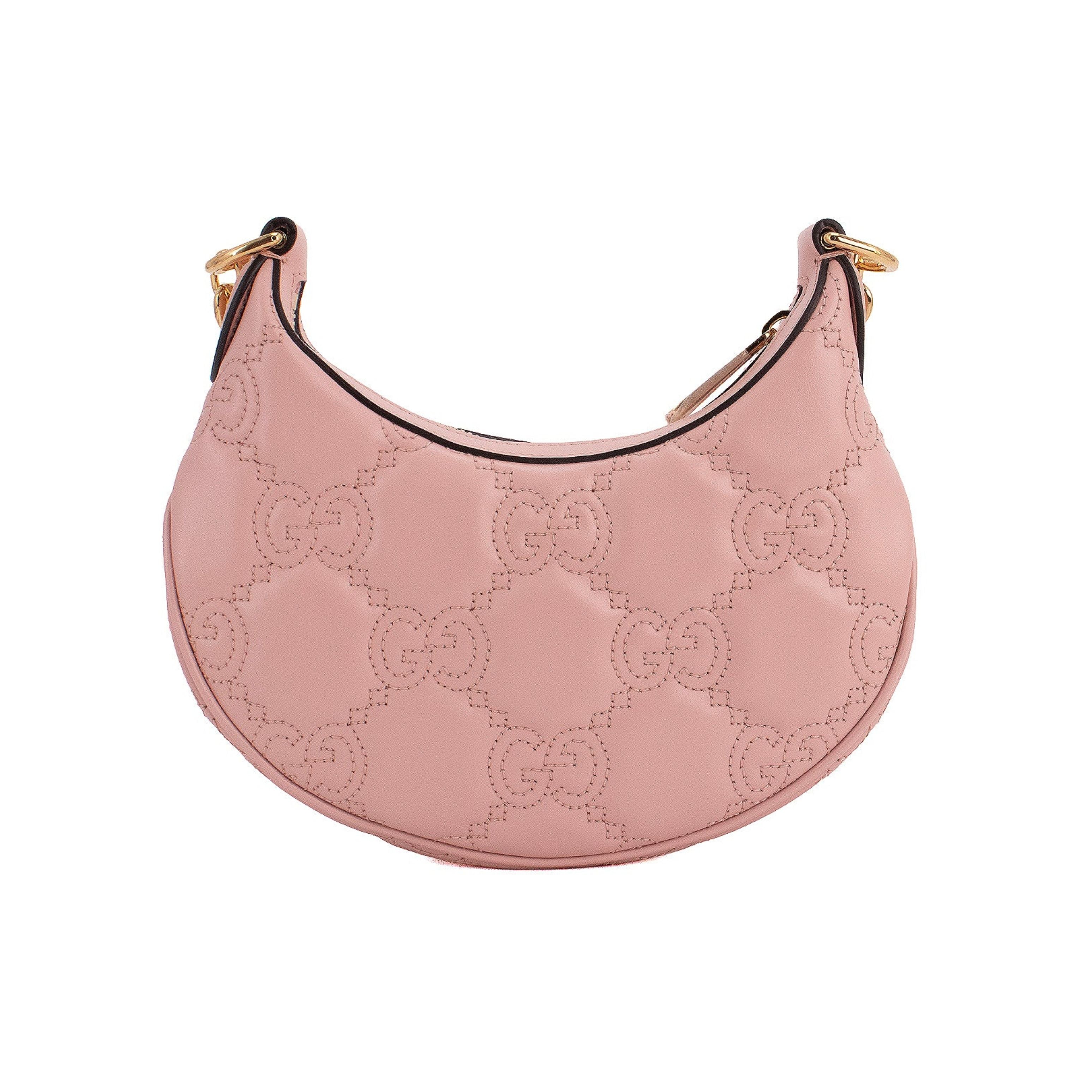 Gucci Sac à bandoulière en cuir matelassé GG rose