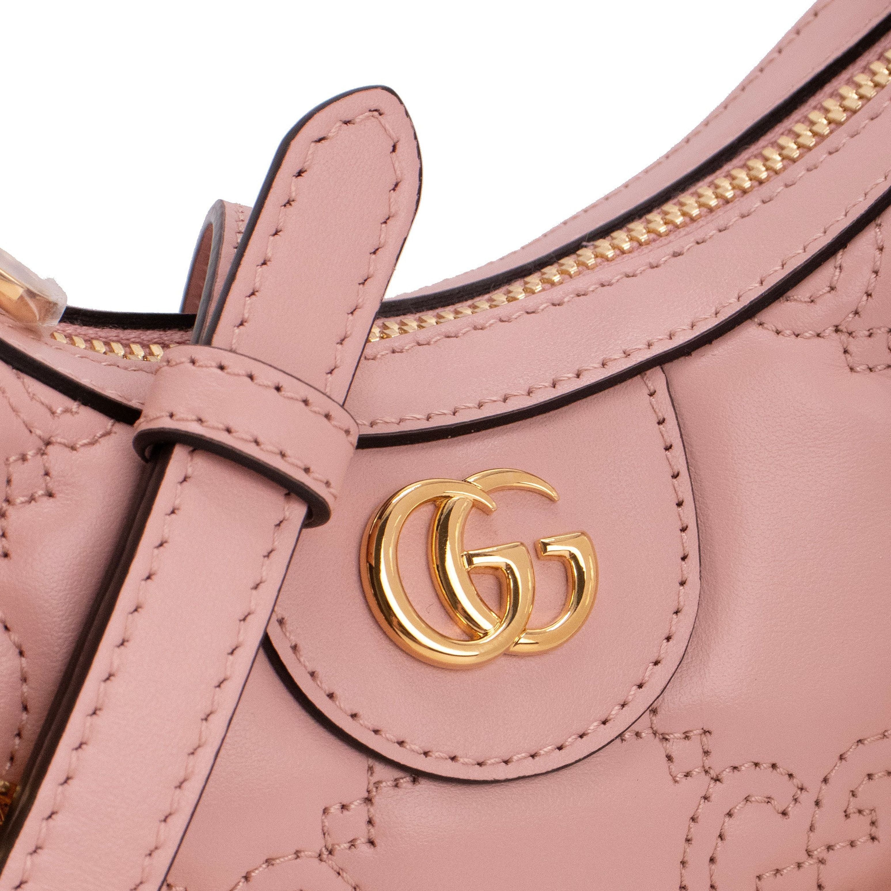 Gucci Sac à bandoulière en cuir matelassé GG rose